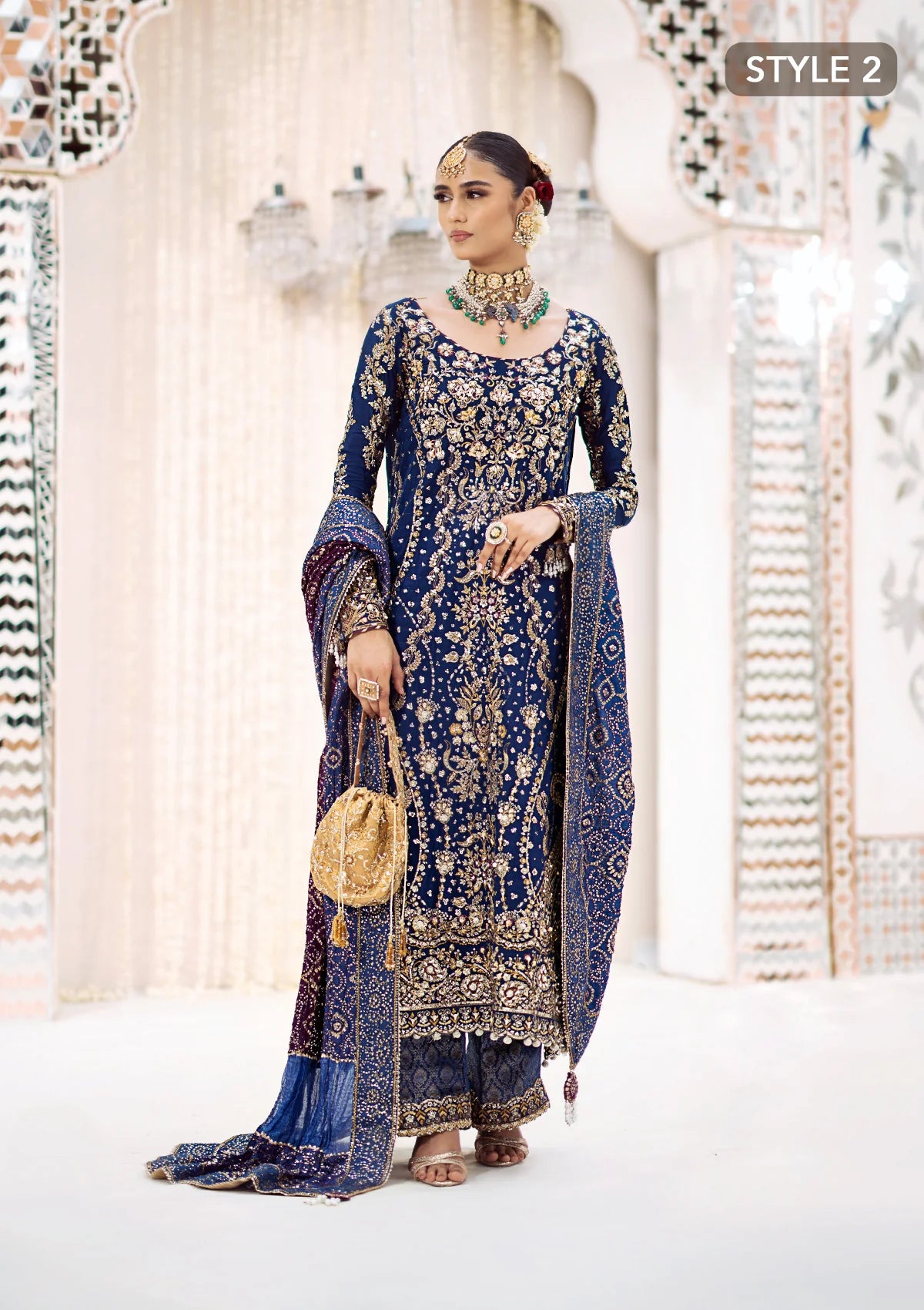 Luxurious medium silk outfit with rich embroidery, organza borders, jamawaar pants, and an embroidered silk dupatta. Styled as gharara or izhaar pants.