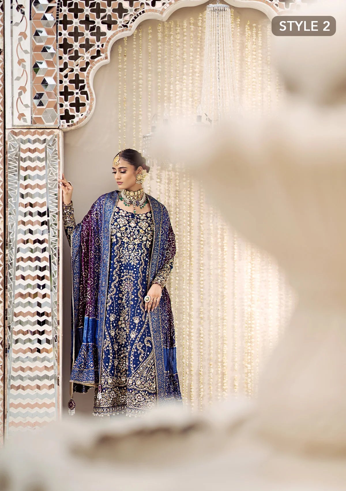 Luxurious medium silk outfit with rich embroidery, organza borders, jamawaar pants, and an embroidered silk dupatta. Styled as gharara or izhaar pants.