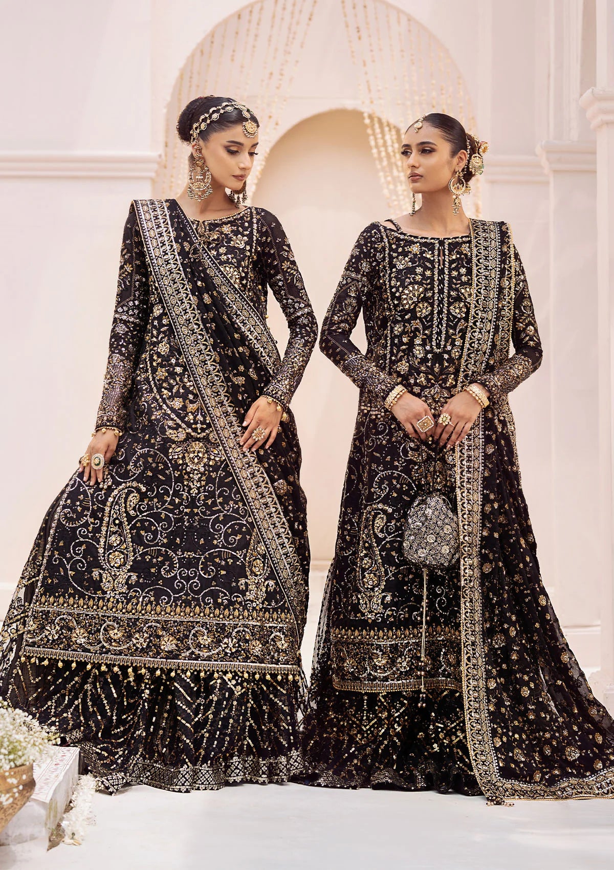 Elegant khaadi net ensemble with embellished organza borders, masoori silk pants, and chiffon dupatta. Styled as long shirt with gharara or crushed frock style.