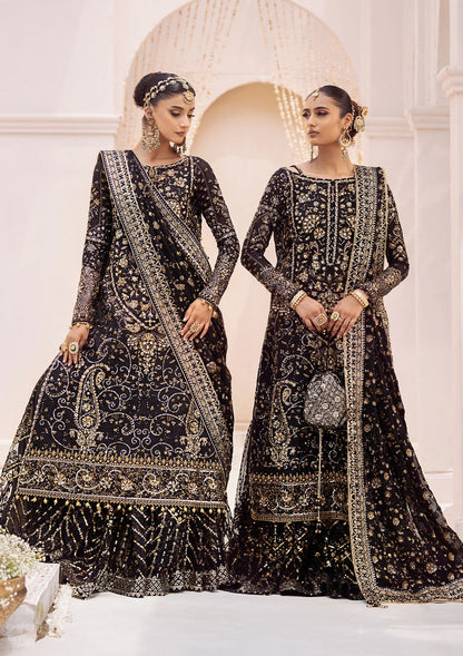 Elegant khaadi net ensemble with embellished organza borders, masoori silk pants, and chiffon dupatta. Styled as long shirt with gharara or crushed frock style.