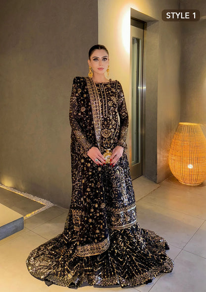 Elegant khaadi net ensemble with embellished organza borders, masoori silk pants, and chiffon dupatta. Styled as long shirt with gharara or crushed frock style.