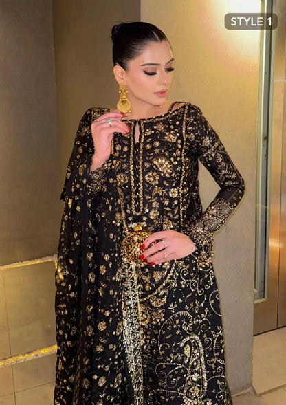 Elegant khaadi net ensemble with embellished organza borders, masoori silk pants, and chiffon dupatta. Styled as long shirt with gharara or crushed frock style.
