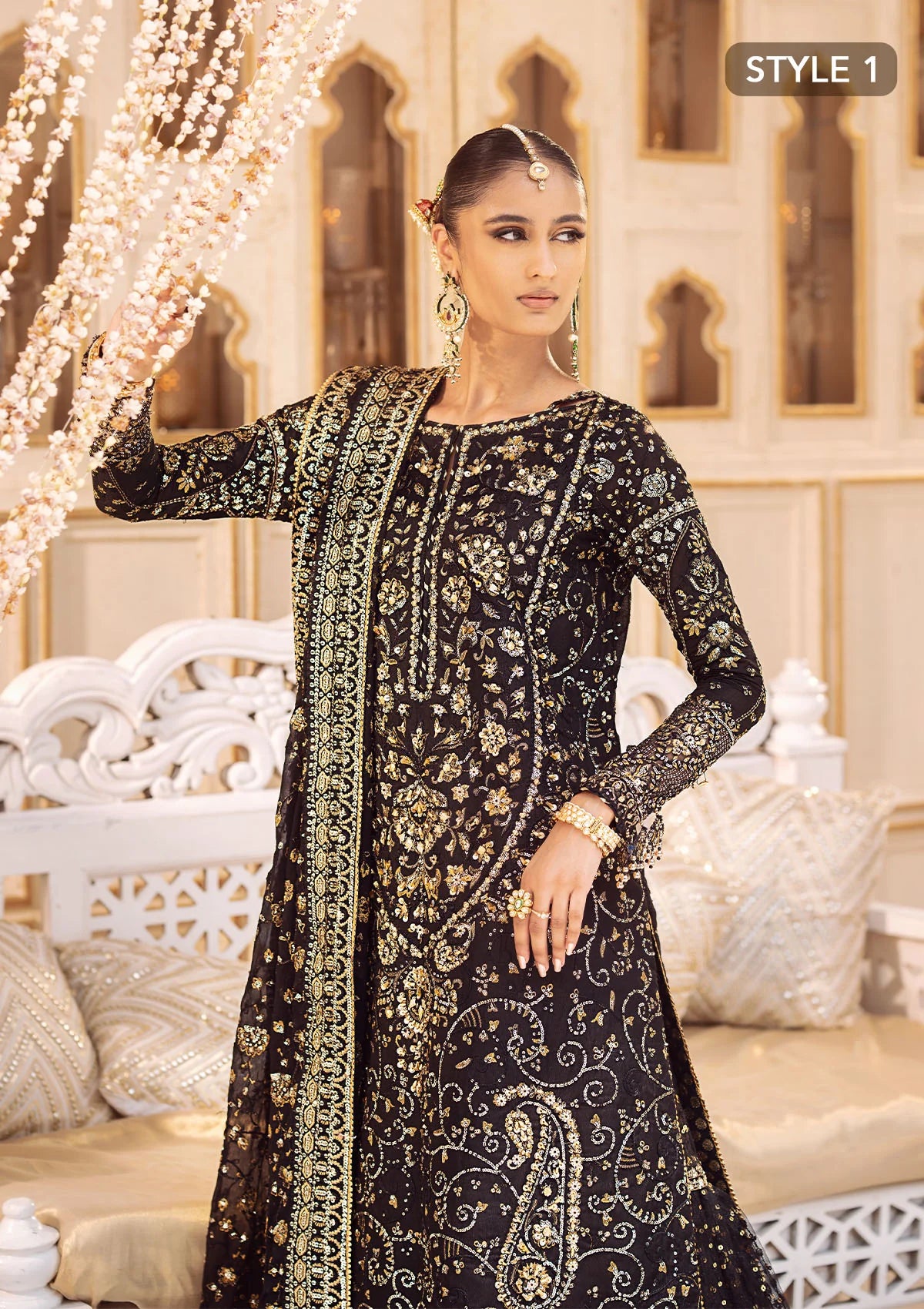 Elegant khaadi net ensemble with embellished organza borders, masoori silk pants, and chiffon dupatta. Styled as long shirt with gharara or crushed frock style.