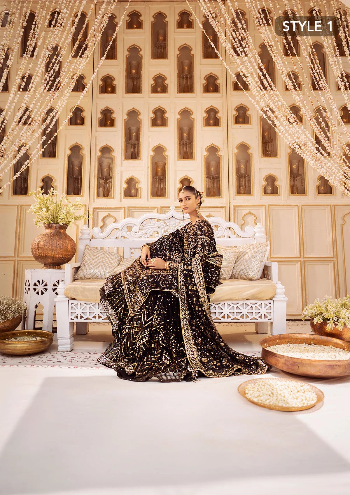 Elegant khaadi net ensemble with embellished organza borders, masoori silk pants, and chiffon dupatta. Styled as long shirt with gharara or crushed frock style.