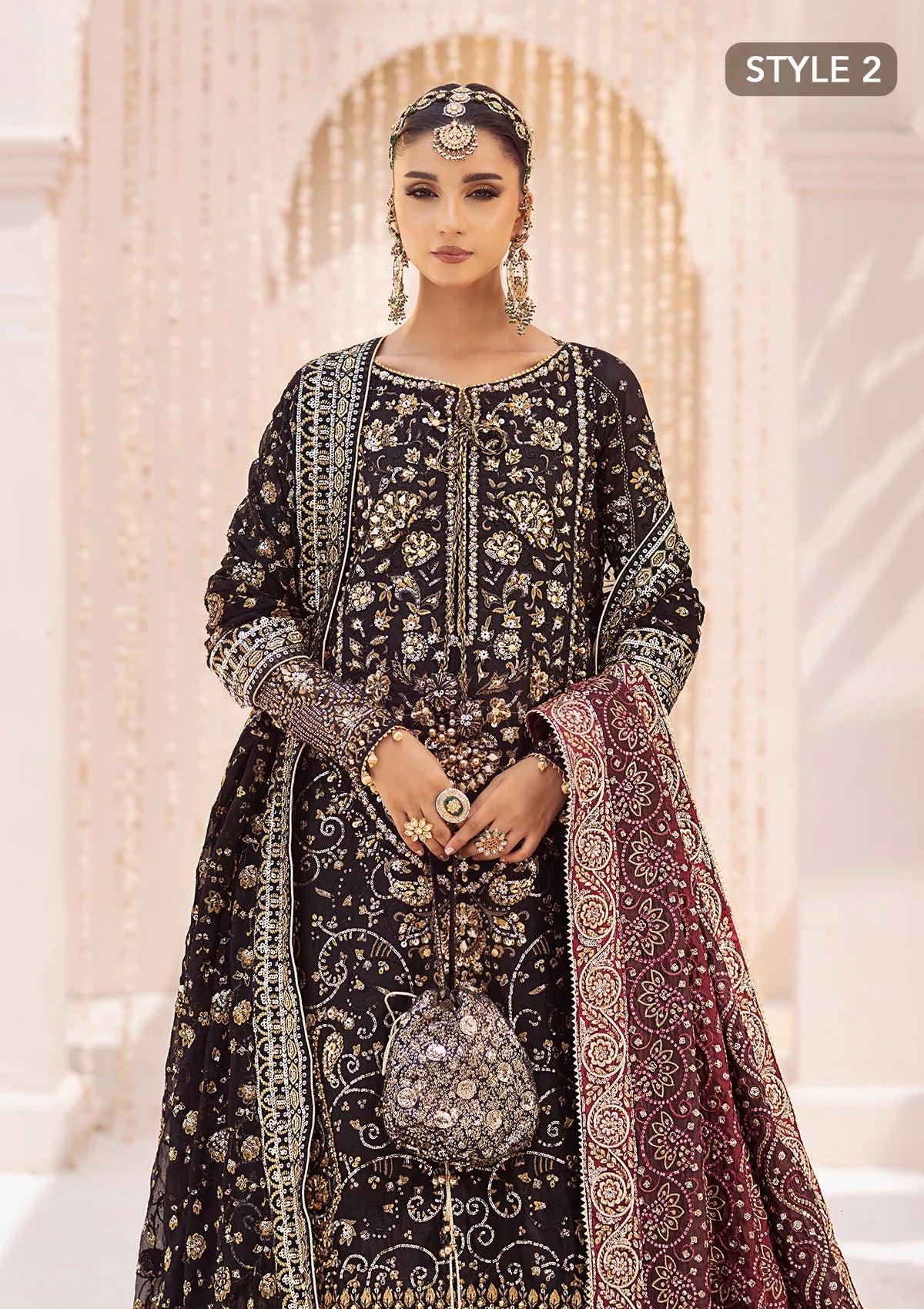 Elegant khaadi net ensemble with embellished organza borders, masoori silk pants, and chiffon dupatta. Styled as long shirt with gharara or crushed frock style.