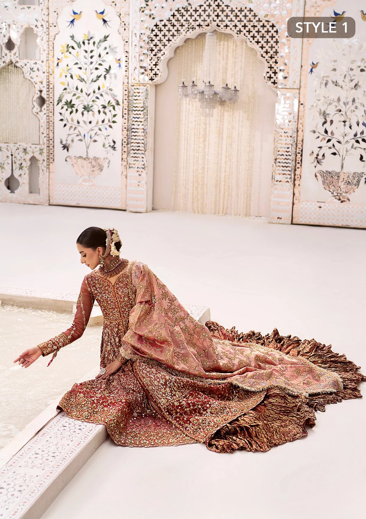 Graceful zari net ensemble with embellished bodice, organza borders, masoori silk pants, and an embroidered tissue dupatta. Styled as kalidaar frock with crushed farshi lehnga or angrakha with crushed sharara.