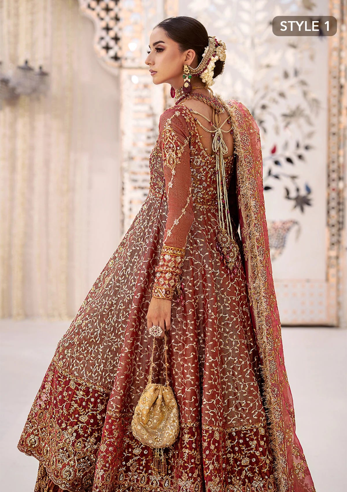 Graceful zari net ensemble with embellished bodice, organza borders, masoori silk pants, and an embroidered tissue dupatta. Styled as kalidaar frock with crushed farshi lehnga or angrakha with crushed sharara.