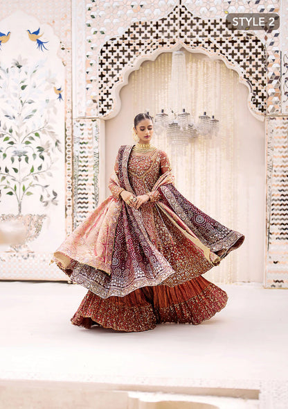 Graceful zari net ensemble with embellished bodice, organza borders, masoori silk pants, and an embroidered tissue dupatta. Styled as kalidaar frock with crushed farshi lehnga or angrakha with crushed sharara.