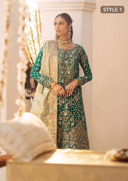 Elegant medium silk ensemble with detailed embroidery, layered borders, jamawaar pants, and a tissue dupatta. Styled as a mid-length shirt with crushed sharara or classic gharara for festive occasions.