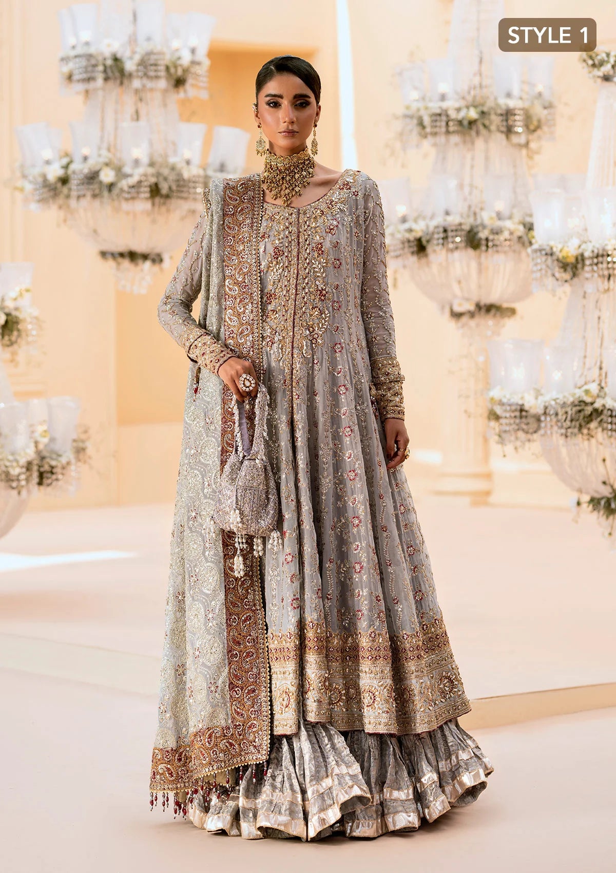 Graceful embroidered chiffon ensemble with organza neckline, silk and organza borders, jamawaar pants, and a chiffon dupatta. Styled as kalidar open front or angrakha sharara.