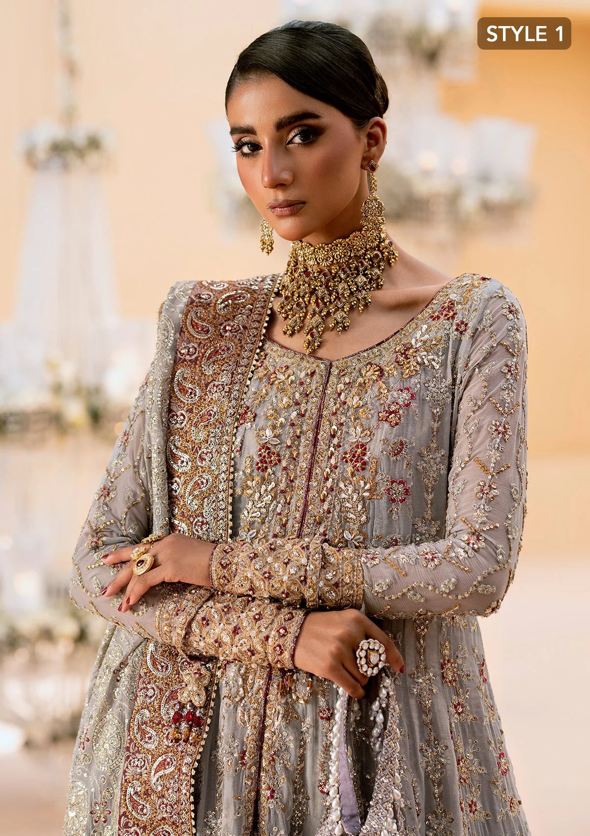 Graceful embroidered chiffon ensemble with organza neckline, silk and organza borders, jamawaar pants, and a chiffon dupatta. Styled as kalidar open front or angrakha sharara.