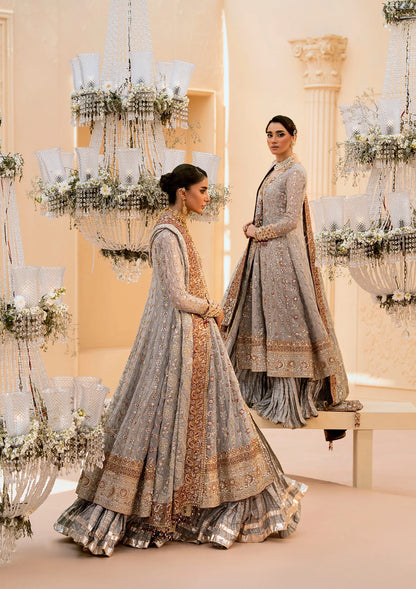 Graceful embroidered chiffon ensemble with organza neckline, silk and organza borders, jamawaar pants, and a chiffon dupatta. Styled as kalidar open front or angrakha sharara.