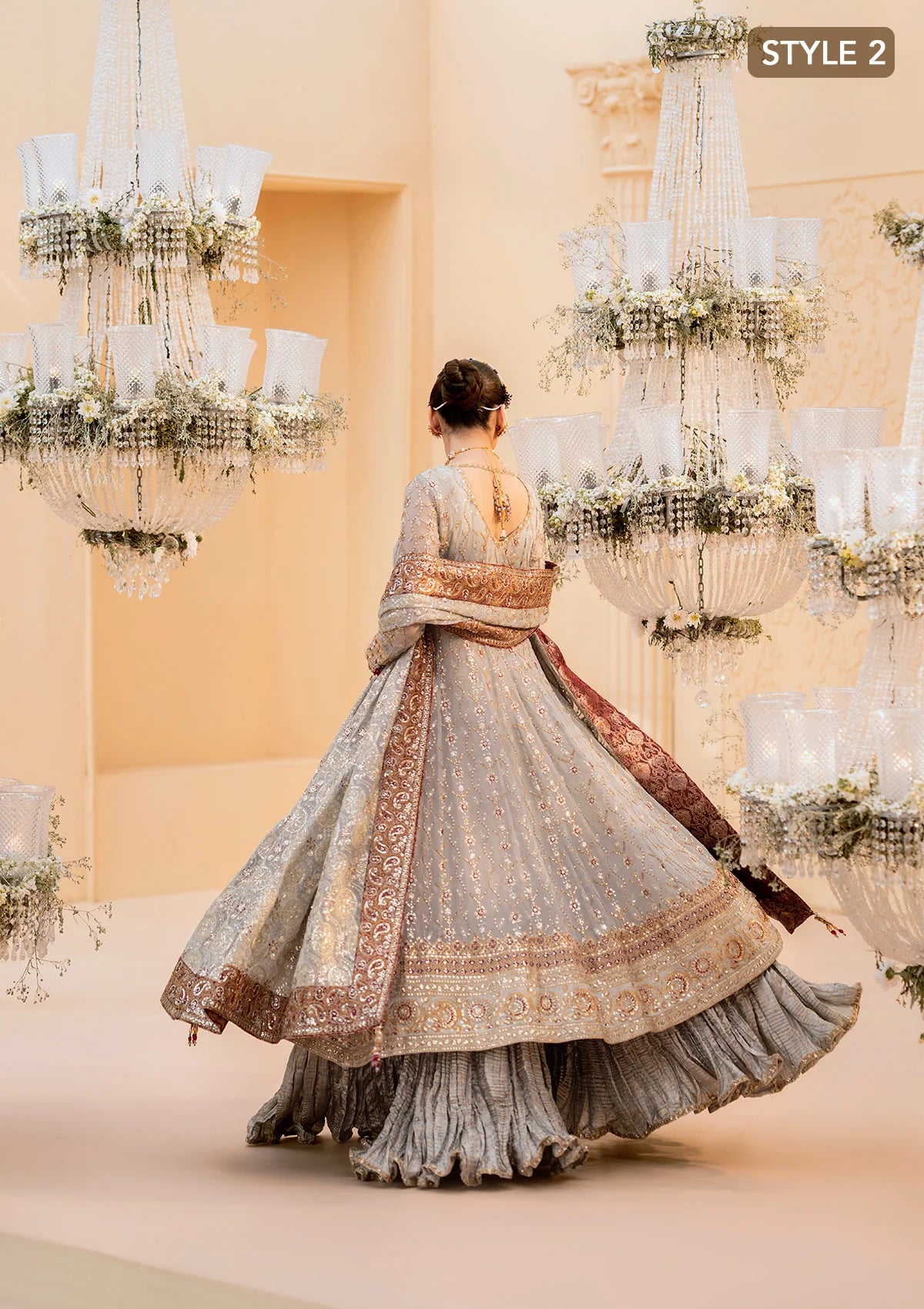 Graceful embroidered chiffon ensemble with organza neckline, silk and organza borders, jamawaar pants, and a chiffon dupatta. Styled as kalidar open front or angrakha sharara.