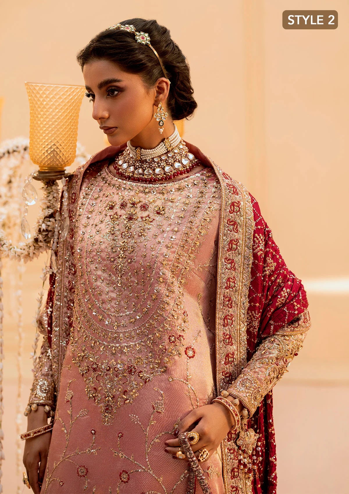 Elegant tissue ensemble with rich embroidery, embellished borders, jamawaar pants, and a silk dupatta. Styled as a long shirt with gharara or izaar pants.