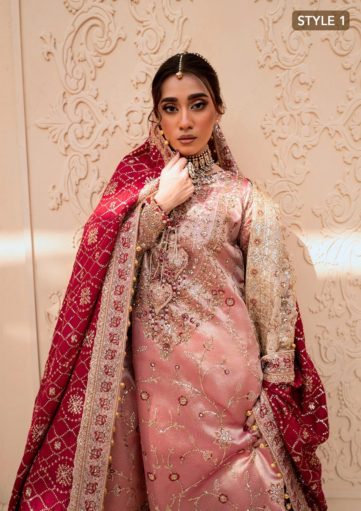 Elegant tissue ensemble with rich embroidery, embellished borders, jamawaar pants, and a silk dupatta. Styled as a long shirt with gharara or izaar pants.