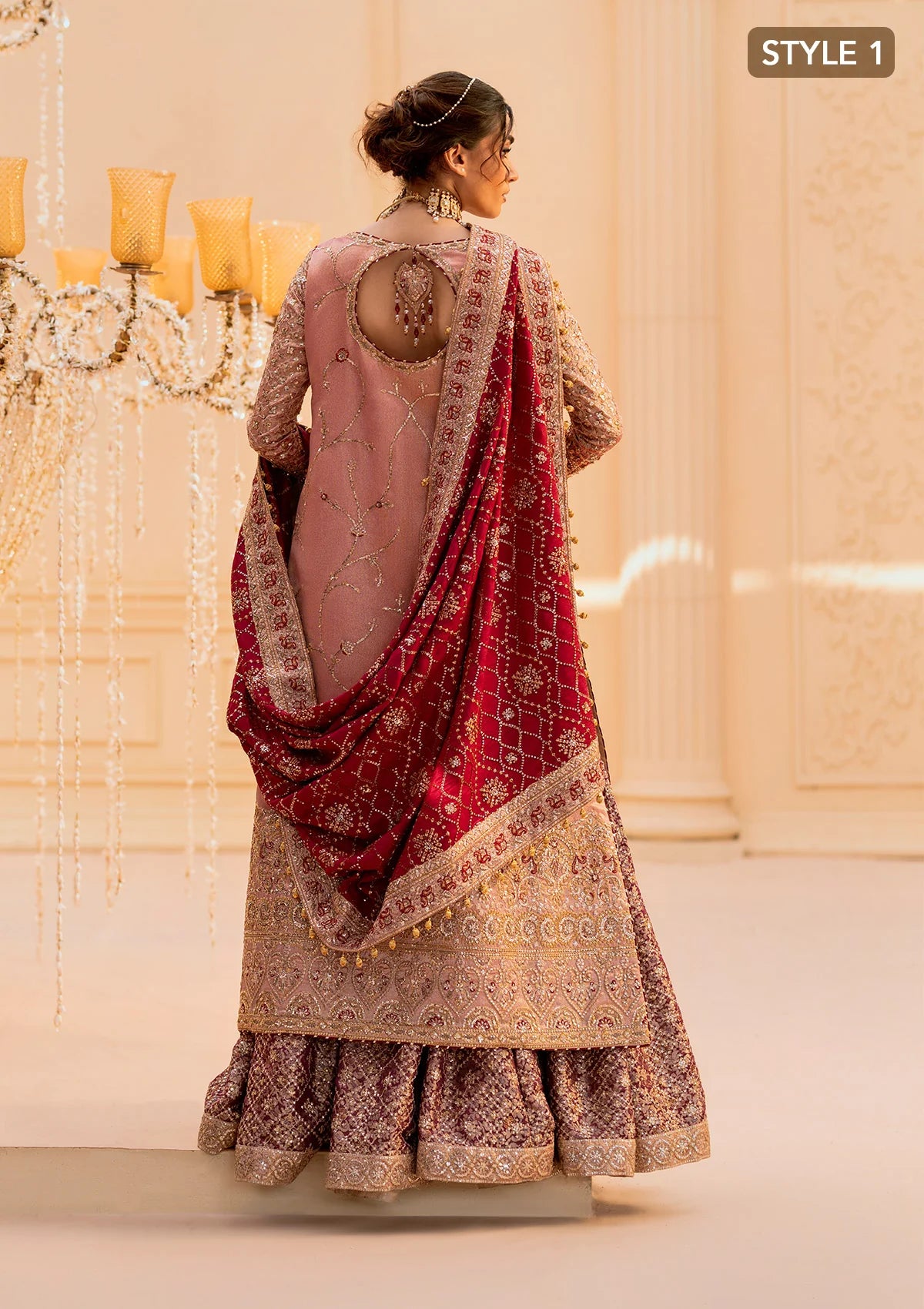 Elegant tissue ensemble with rich embroidery, embellished borders, jamawaar pants, and a silk dupatta. Styled as a long shirt with gharara or izaar pants.