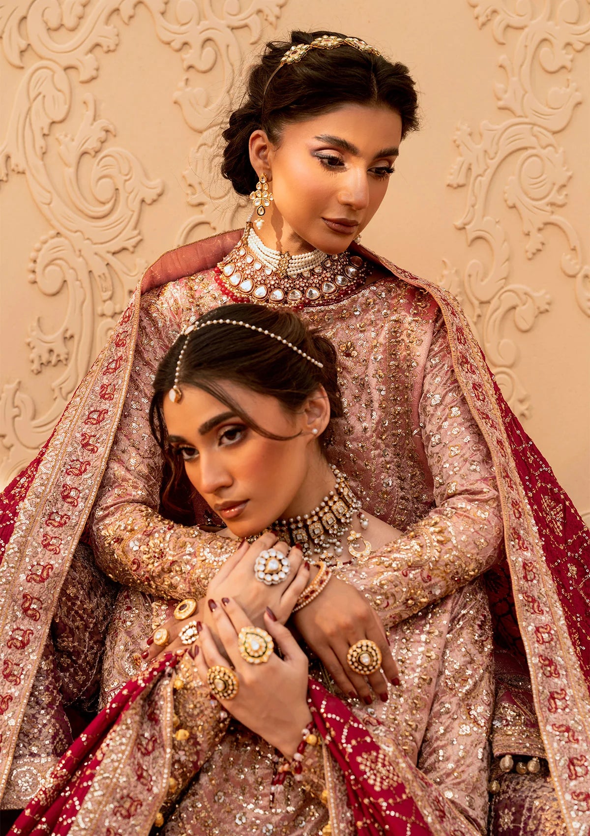 Elegant tissue ensemble with rich embroidery, embellished borders, jamawaar pants, and a silk dupatta. Styled as a long shirt with gharara or izaar pants.
