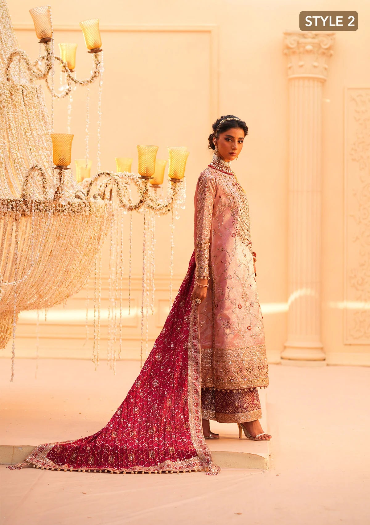 Elegant tissue ensemble with rich embroidery, embellished borders, jamawaar pants, and a silk dupatta. Styled as a long shirt with gharara or izaar pants.