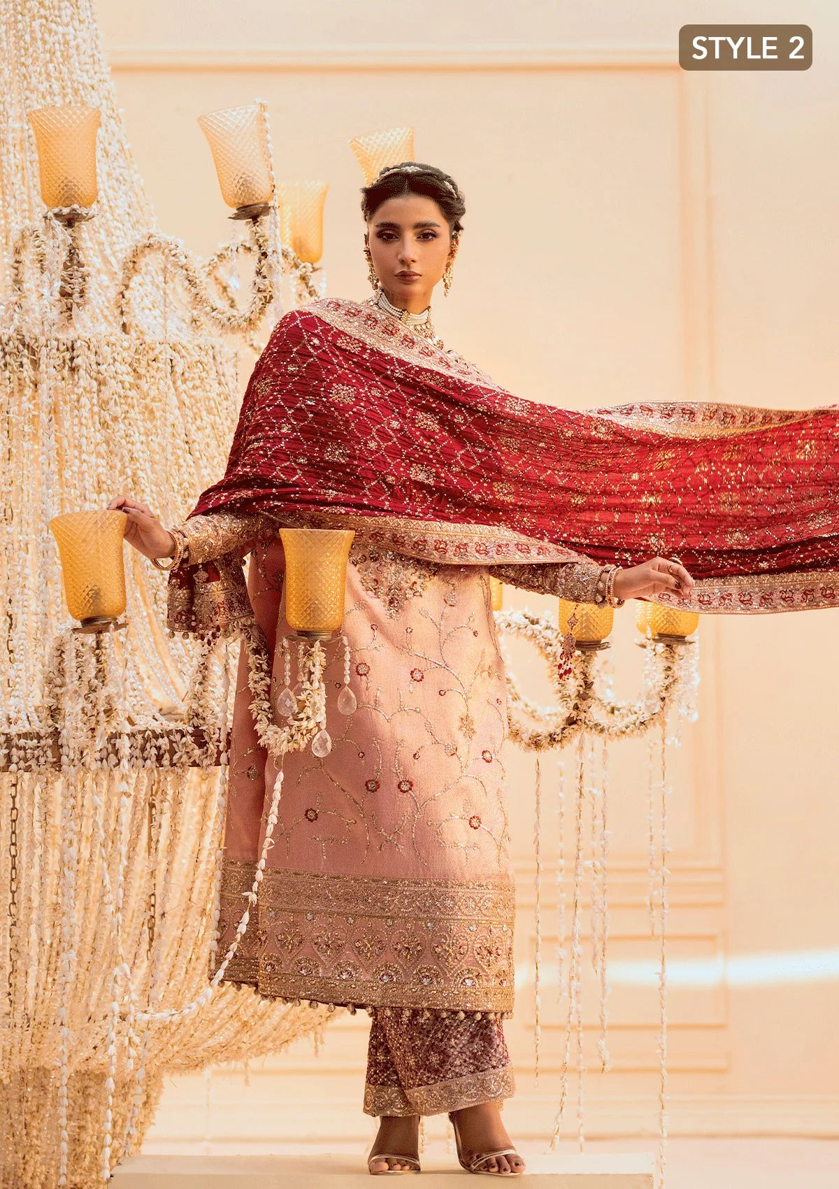 Elegant tissue ensemble with rich embroidery, embellished borders, jamawaar pants, and a silk dupatta. Styled as a long shirt with gharara or izaar pants.