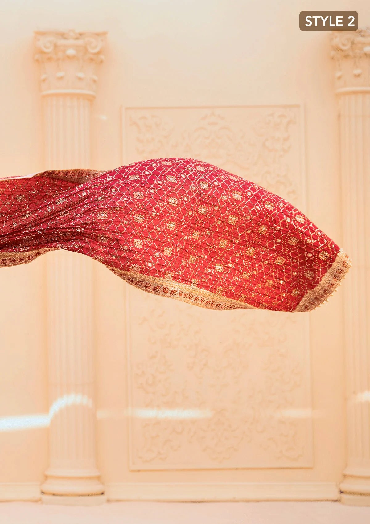 Elegant tissue ensemble with rich embroidery, embellished borders, jamawaar pants, and a silk dupatta. Styled as a long shirt with gharara or izaar pants.