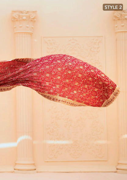Elegant tissue ensemble with rich embroidery, embellished borders, jamawaar pants, and a silk dupatta. Styled as a long shirt with gharara or izaar pants.