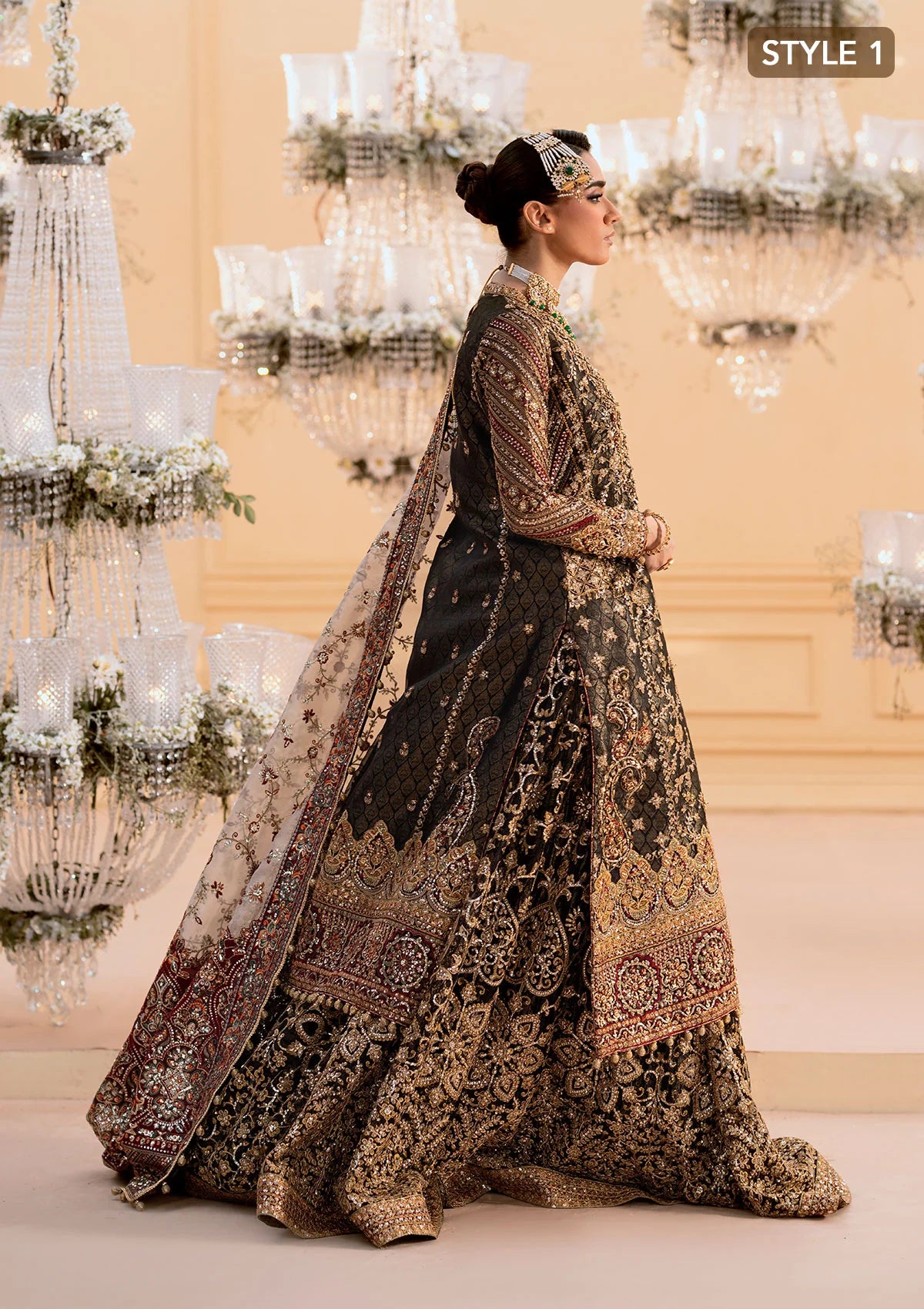 Luxurious organza ensemble with embellished front, intricate borders, jamawaar pants, embroidered net panels, and a tissue jaal dupatta. Styled as a long shirt with lehnga or gharara.