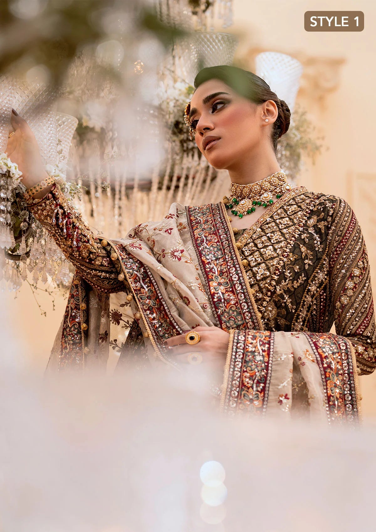 Luxurious organza ensemble with embellished front, intricate borders, jamawaar pants, embroidered net panels, and a tissue jaal dupatta. Styled as a long shirt with lehnga or gharara.