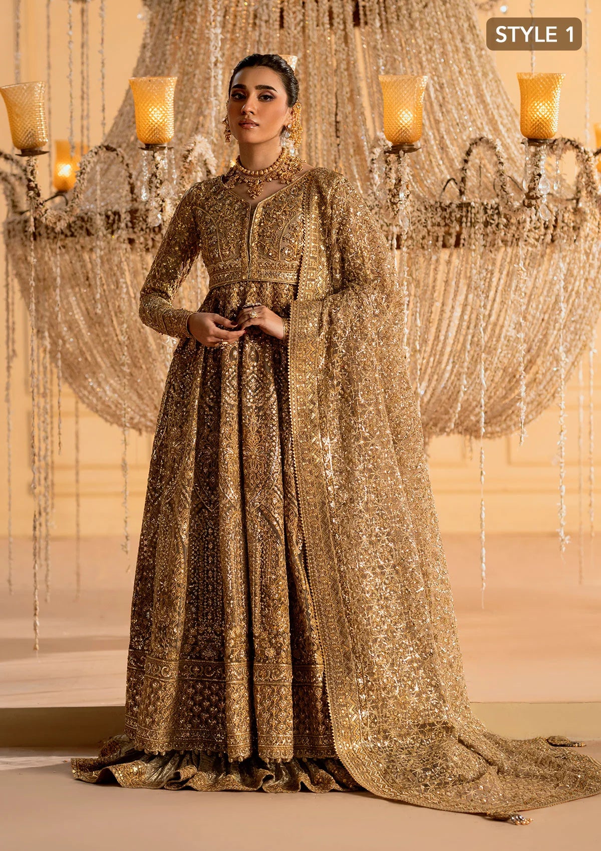 Exquisite embroidered net ensemble with embellished bodice, organza borders, jamawaar pants, and an embroidered net dupatta. Styled as kalidar with crushed skirt or kurti with lehnga.