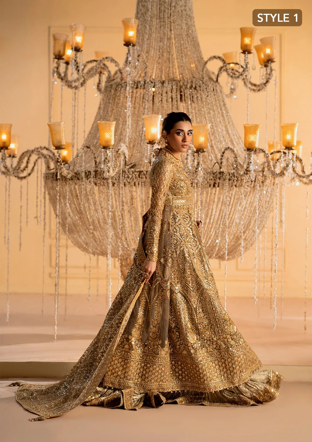 Exquisite embroidered net ensemble with embellished bodice, organza borders, jamawaar pants, and an embroidered net dupatta. Styled as kalidar with crushed skirt or kurti with lehnga.