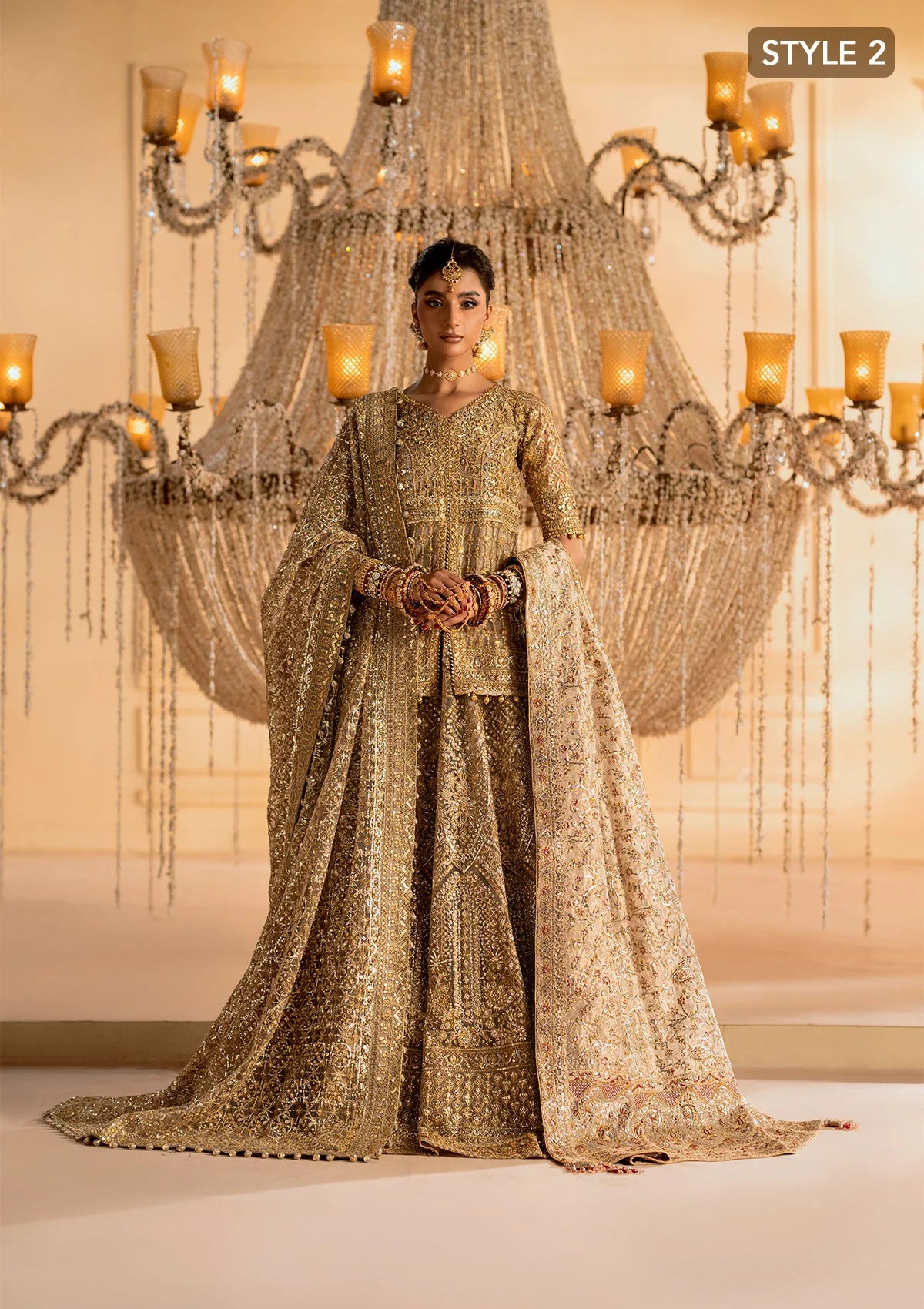 Exquisite embroidered net ensemble with embellished bodice, organza borders, jamawaar pants, and an embroidered net dupatta. Styled as kalidar with crushed skirt or kurti with lehnga.