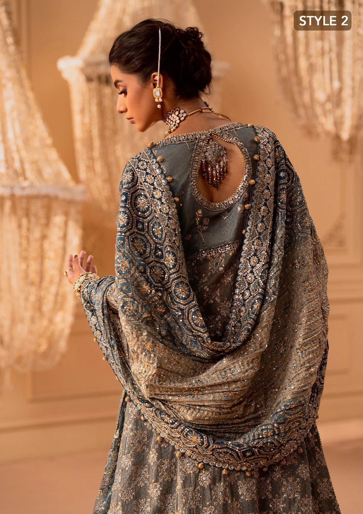 Elegant embroidered net ensemble with embellished bodice, organza borders, masoori silk pants, and a chiffon dupatta. Styled as a side-slit shirt with crushed frock or open-front shirt with skirt.