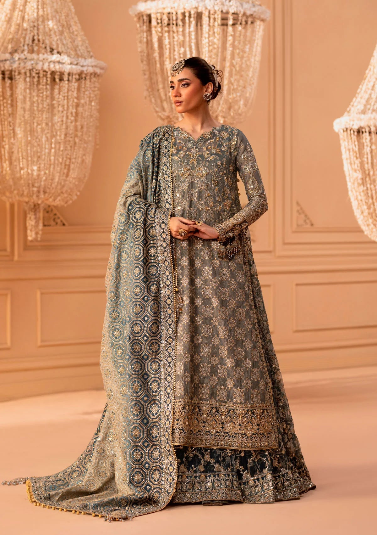 Elegant embroidered net ensemble with embellished bodice, organza borders, masoori silk pants, and a chiffon dupatta. Styled as a side-slit shirt with crushed frock or open-front shirt with skirt.