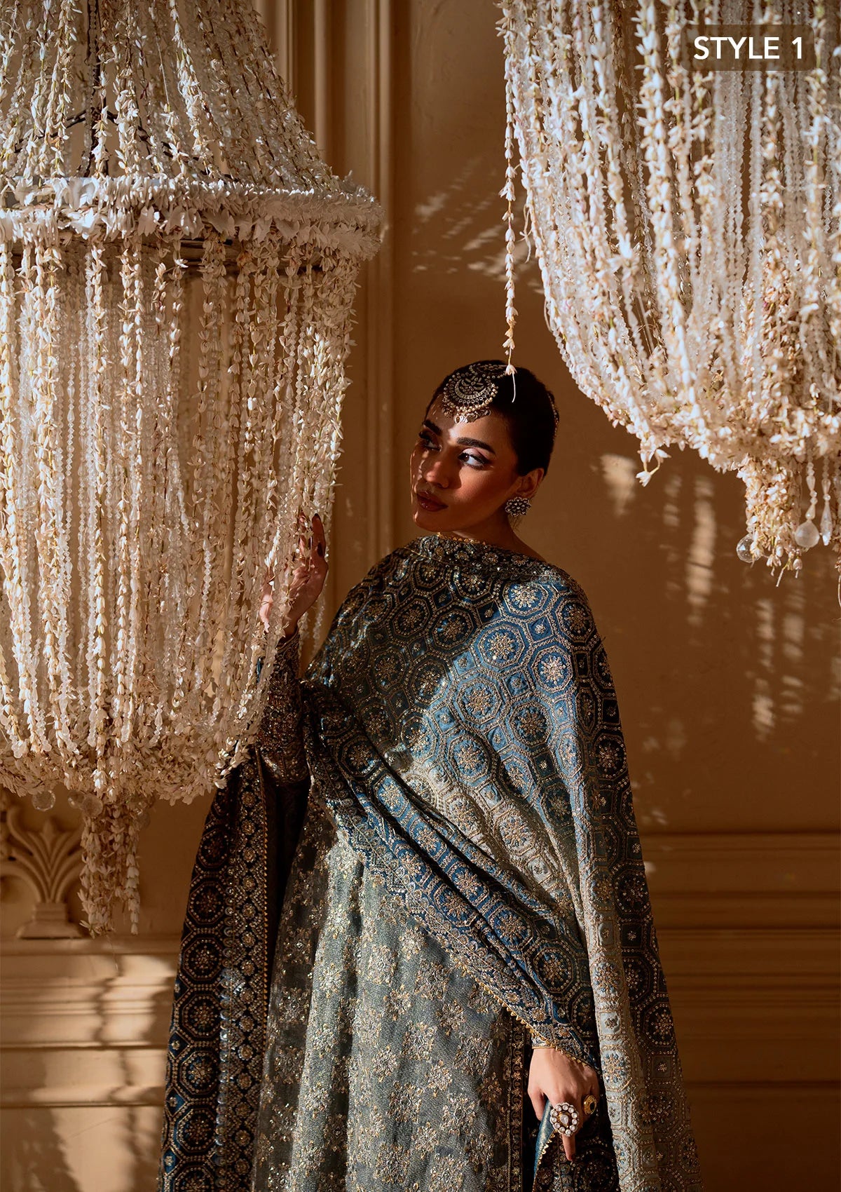 Elegant embroidered net ensemble with embellished bodice, organza borders, masoori silk pants, and a chiffon dupatta. Styled as a side-slit shirt with crushed frock or open-front shirt with skirt.