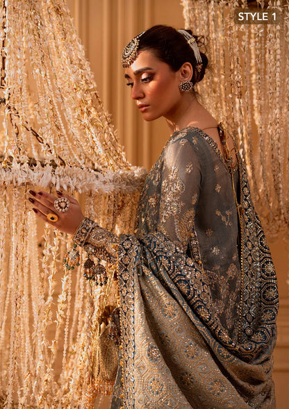 Elegant embroidered net ensemble with embellished bodice, organza borders, masoori silk pants, and a chiffon dupatta. Styled as a side-slit shirt with crushed frock or open-front shirt with skirt.
