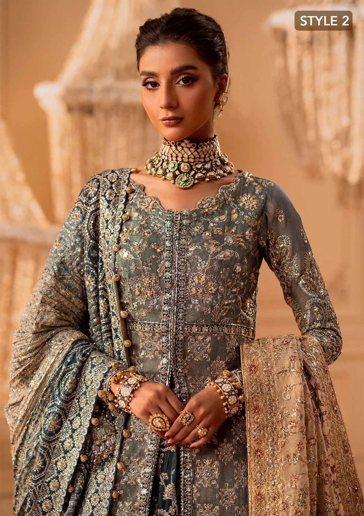 Elegant embroidered net ensemble with embellished bodice, organza borders, masoori silk pants, and a chiffon dupatta. Styled as a side-slit shirt with crushed frock or open-front shirt with skirt.