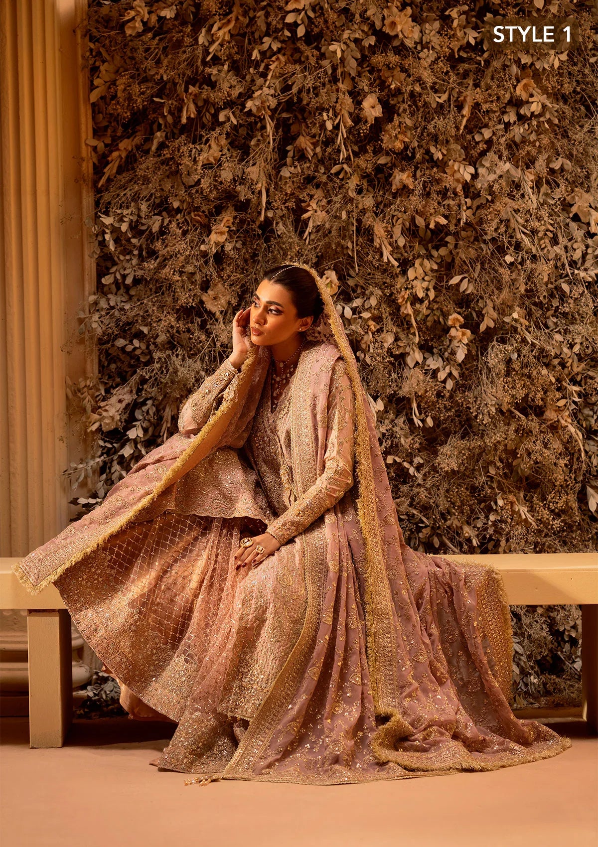 Elegant khaadi net ensemble with embellished organza neckline, detailed borders, masoori silk pants, and chiffon dupatta. Styled as angrakha with gharara or side-slit long shirt with crushed frock.