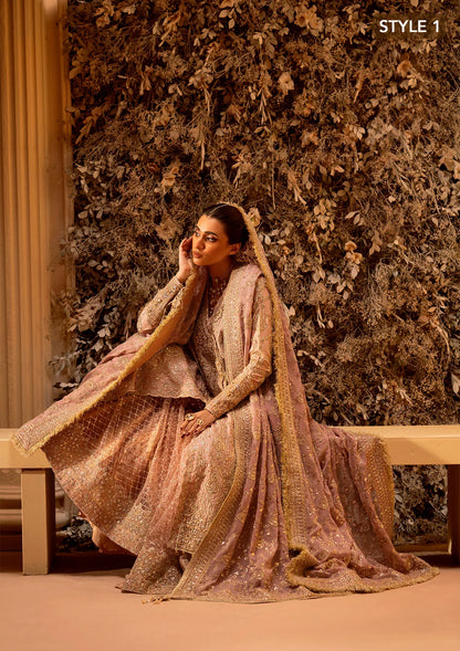 Elegant khaadi net ensemble with embellished organza neckline, detailed borders, masoori silk pants, and chiffon dupatta. Styled as angrakha with gharara or side-slit long shirt with crushed frock.