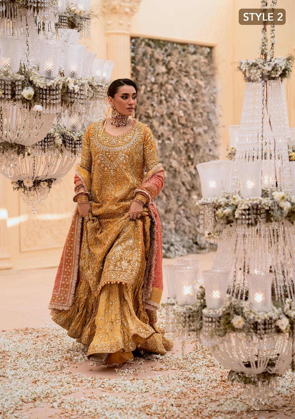 Graceful khaadi net ensemble with embellished organza neckline, embroidered jamawaar pants, and a chiffon dupatta. Styled with farshi gharara or crushed sharara for festive elegance.
