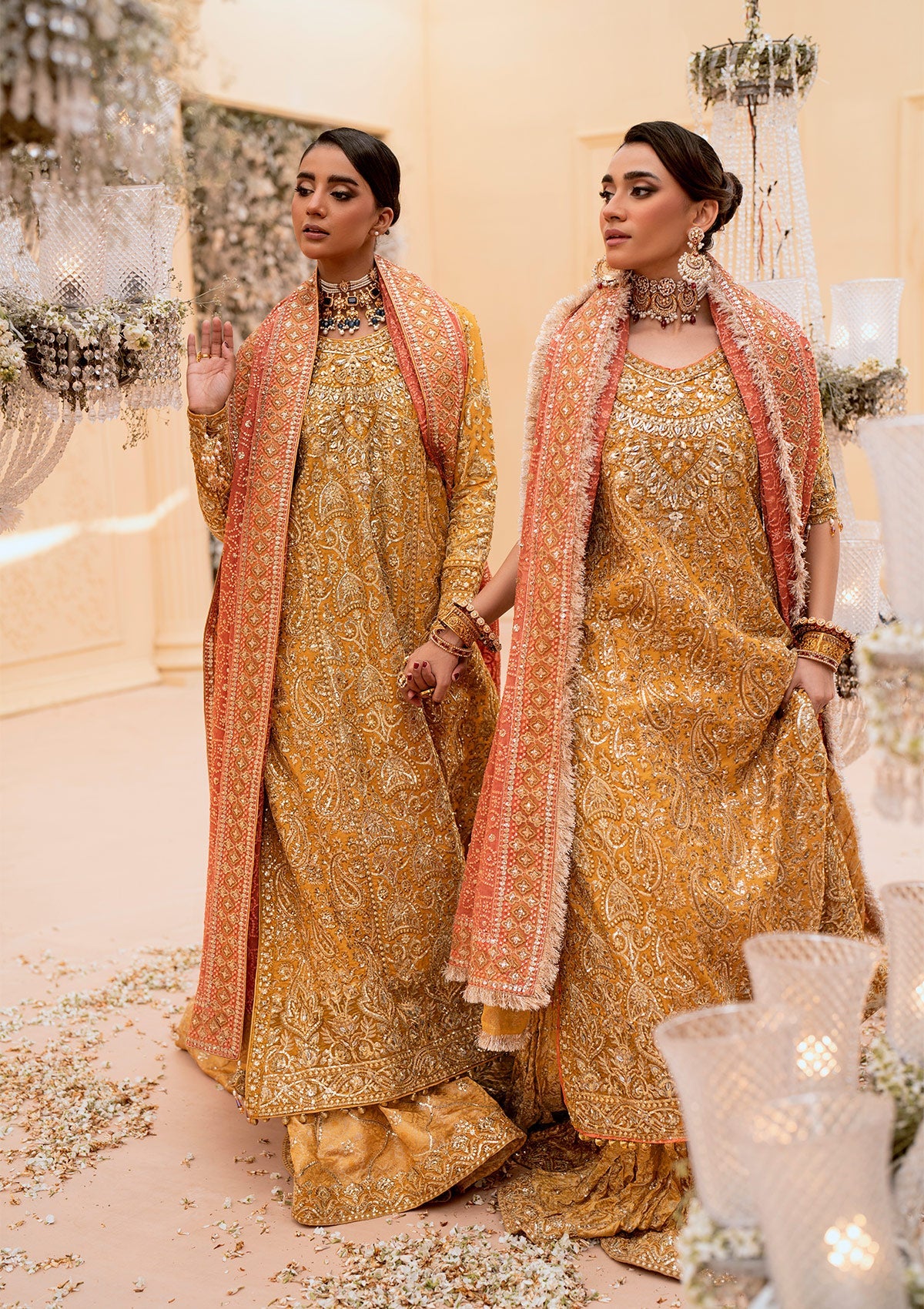 Graceful khaadi net ensemble with embellished organza neckline, embroidered jamawaar pants, and a chiffon dupatta. Styled with farshi gharara or crushed sharara for festive elegance.