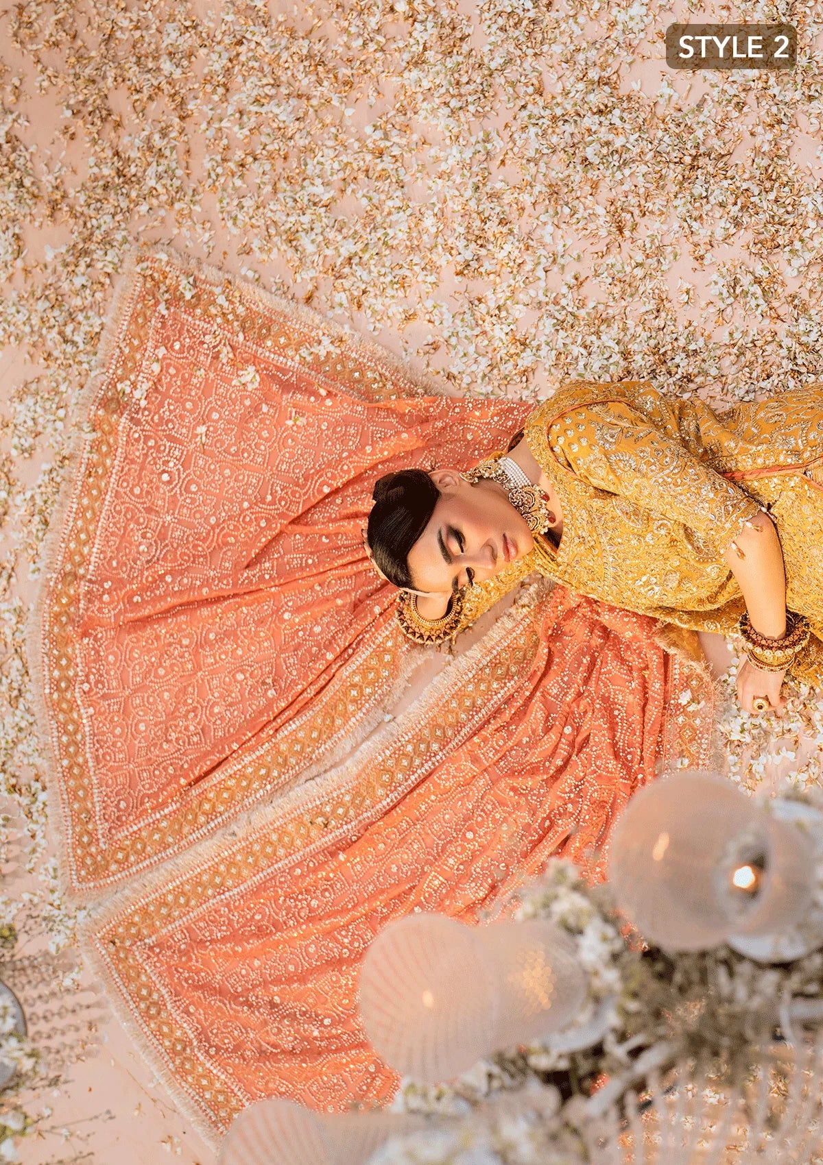 Graceful khaadi net ensemble with embellished organza neckline, embroidered jamawaar pants, and a chiffon dupatta. Styled with farshi gharara or crushed sharara for festive elegance.