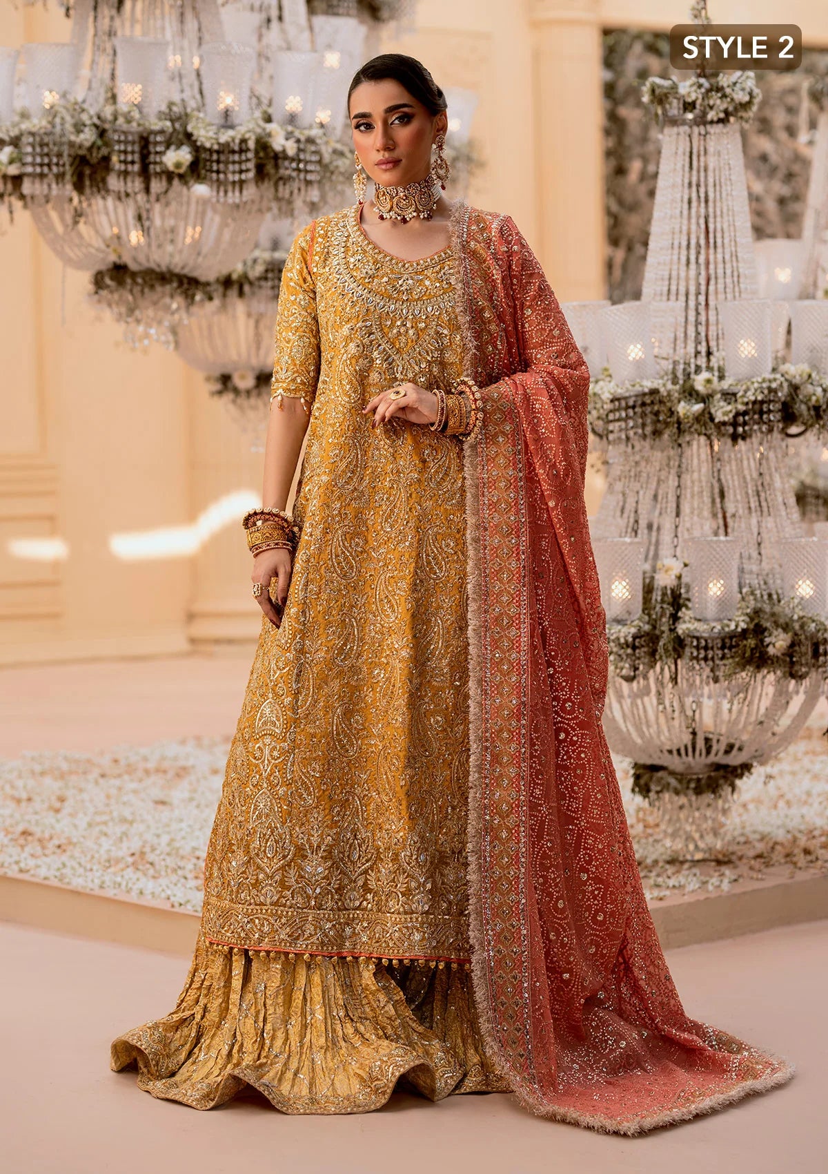 Graceful khaadi net ensemble with embellished organza neckline, embroidered jamawaar pants, and a chiffon dupatta. Styled with farshi gharara or crushed sharara for festive elegance.