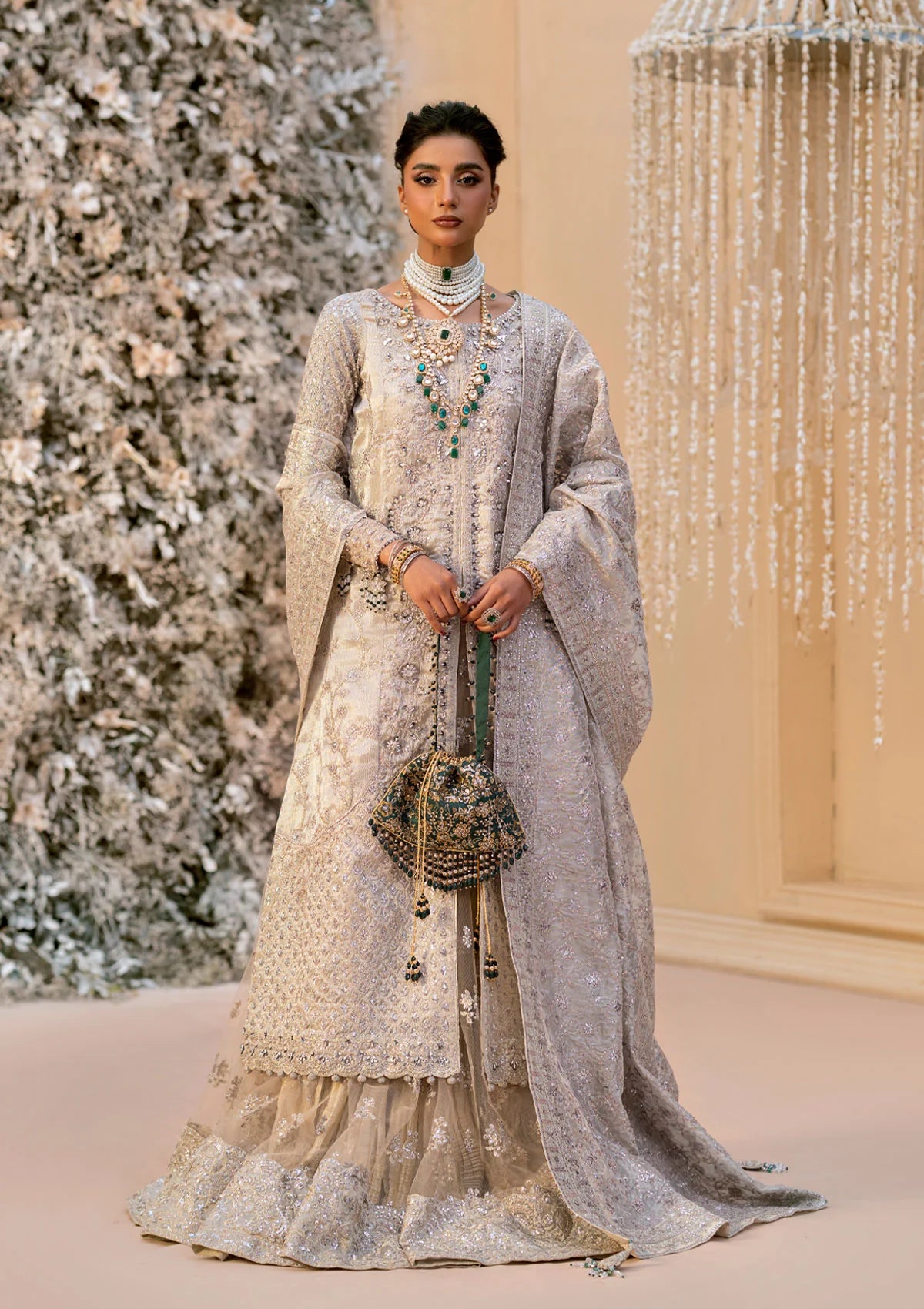 Opulent kundan zari ensemble with embellished panels, intricate jaal work, tissue borders, masoori silk pants, and an embroidered tissue dupatta. Styled as open-front shirt with crushed skirt or side-slit open shirt with crushed frock.