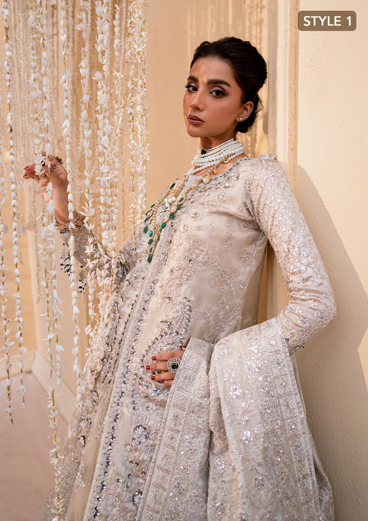 Opulent kundan zari ensemble with embellished panels, intricate jaal work, tissue borders, masoori silk pants, and an embroidered tissue dupatta. Styled as open-front shirt with crushed skirt or side-slit open shirt with crushed frock.