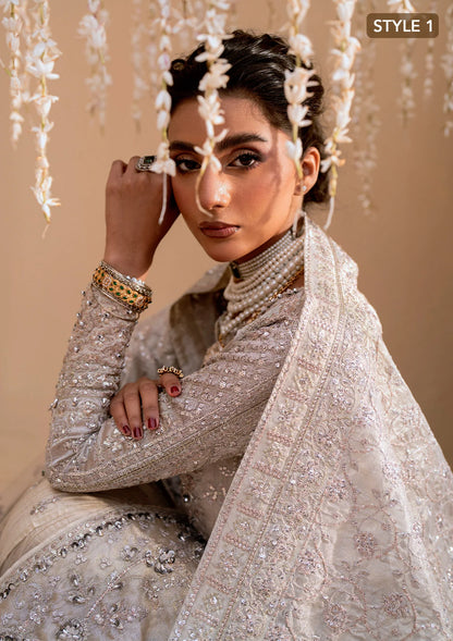 Opulent kundan zari ensemble with embellished panels, intricate jaal work, tissue borders, masoori silk pants, and an embroidered tissue dupatta. Styled as open-front shirt with crushed skirt or side-slit open shirt with crushed frock.