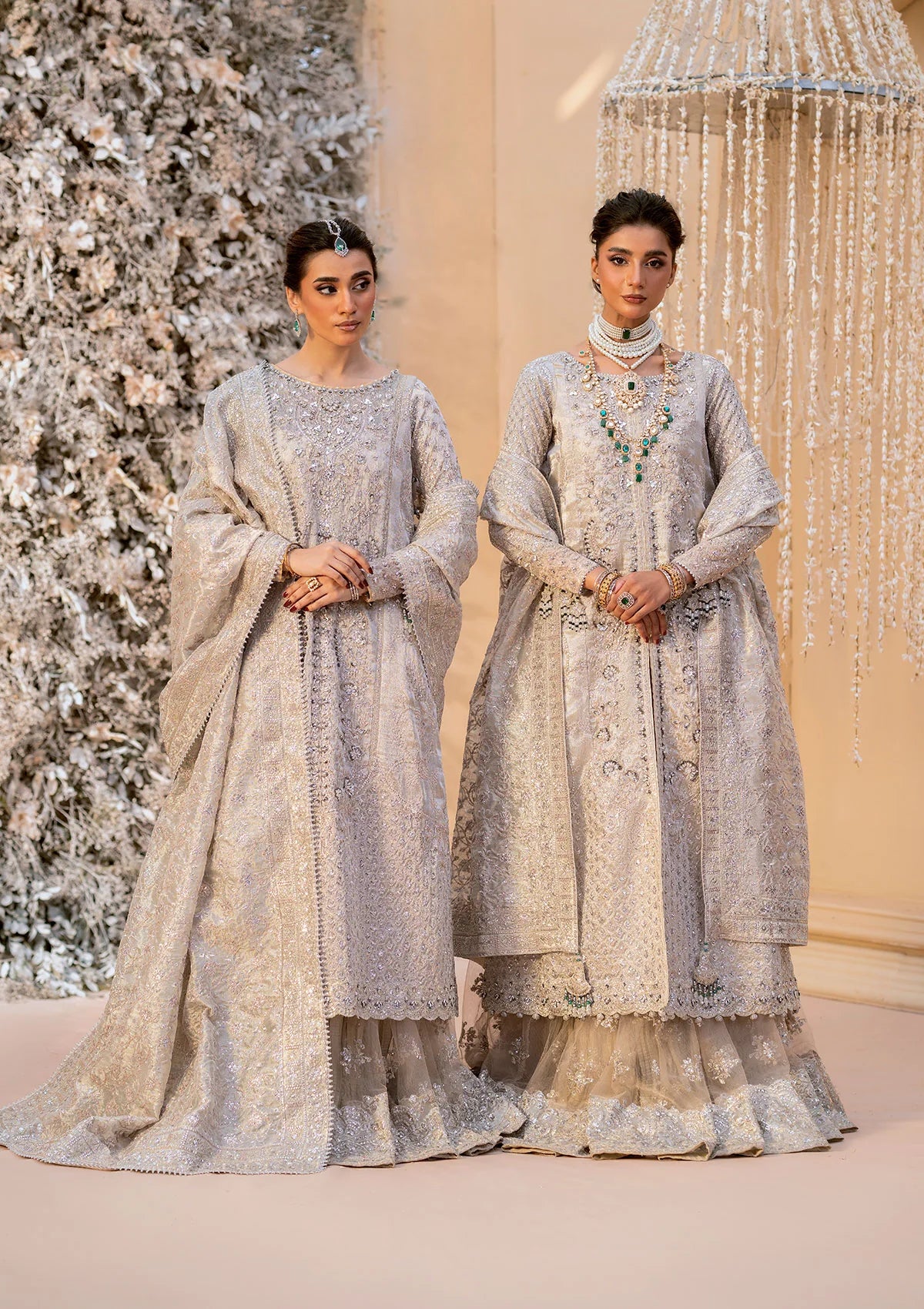 Opulent kundan zari ensemble with embellished panels, intricate jaal work, tissue borders, masoori silk pants, and an embroidered tissue dupatta. Styled as open-front shirt with crushed skirt or side-slit open shirt with crushed frock.