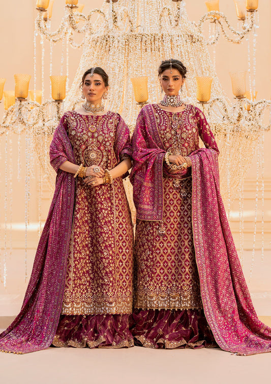 Luxurious kataan silk outfit with intricate jaal embroidery, embellished neckline, embroidered sleeves, crushed skirt or gharara styling, silk dupatta, and refined organza details.