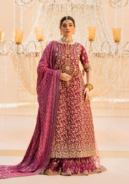 Luxurious kataan silk outfit with intricate jaal embroidery, embellished neckline, embroidered sleeves, crushed skirt or gharara styling, silk dupatta, and refined organza details.