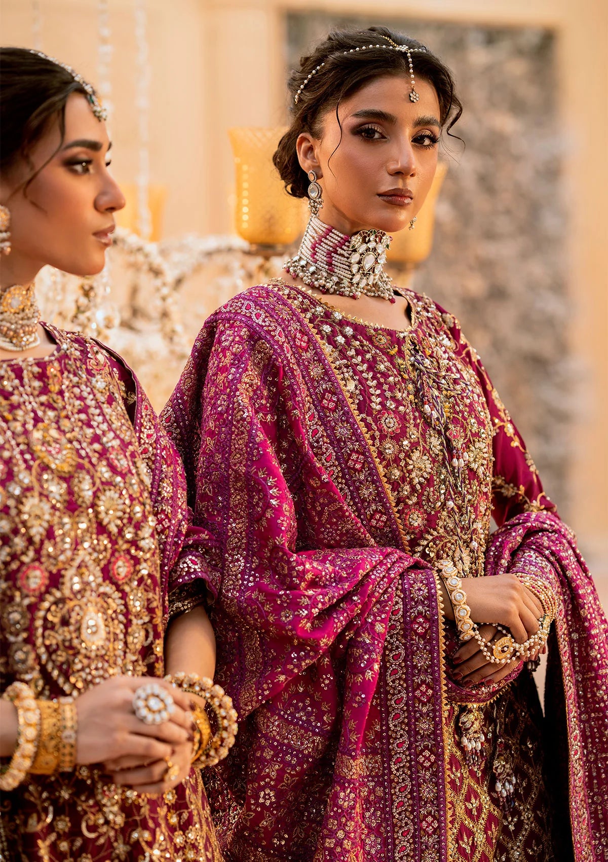 Luxurious kataan silk outfit with intricate jaal embroidery, embellished neckline, embroidered sleeves, crushed skirt or gharara styling, silk dupatta, and refined organza details.