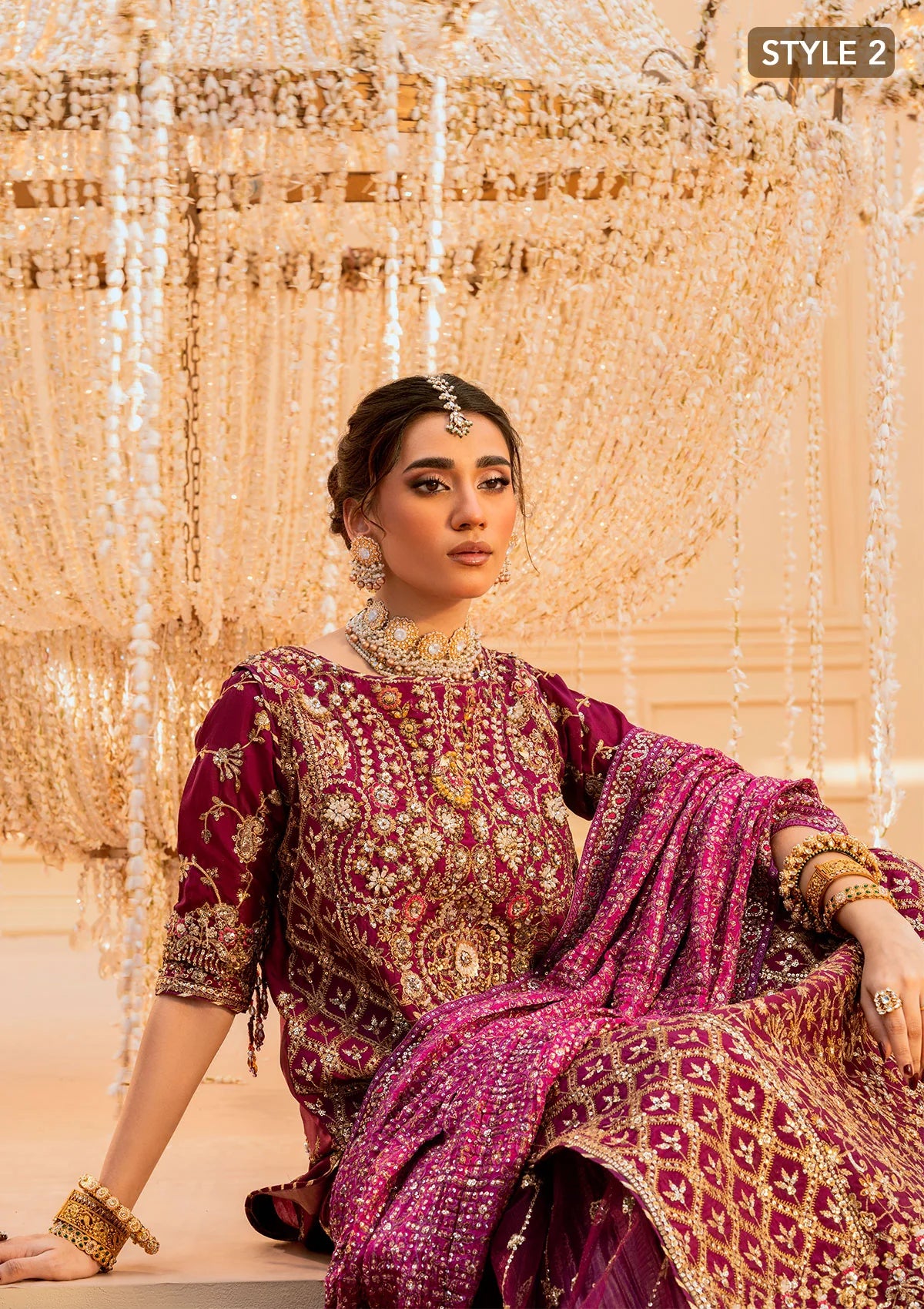 Luxurious kataan silk outfit with intricate jaal embroidery, embellished neckline, embroidered sleeves, crushed skirt or gharara styling, silk dupatta, and refined organza details.