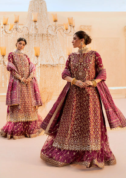 Luxurious kataan silk outfit with intricate jaal embroidery, embellished neckline, embroidered sleeves, crushed skirt or gharara styling, silk dupatta, and refined organza details.